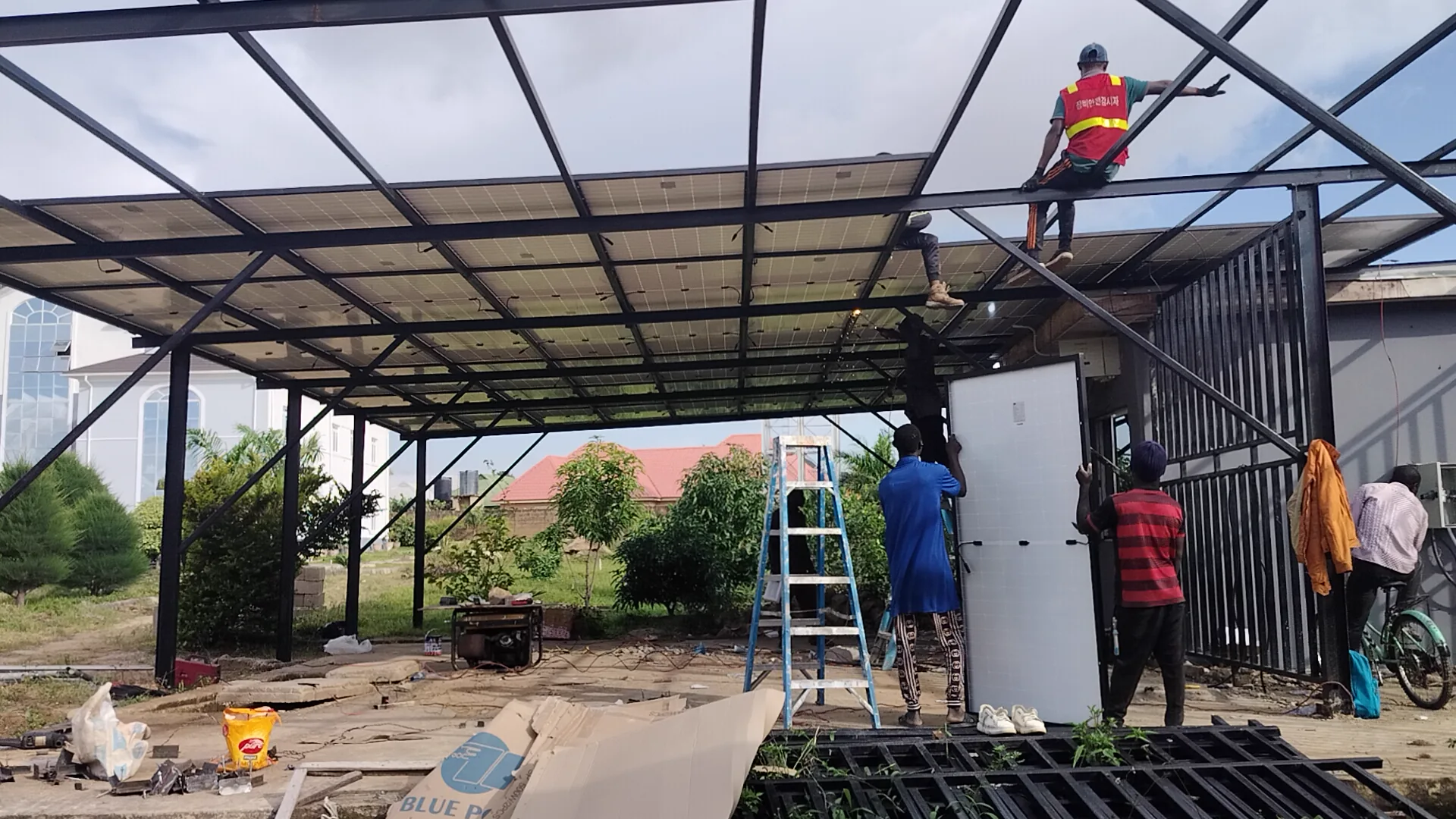 Solar array work on the carport structure
