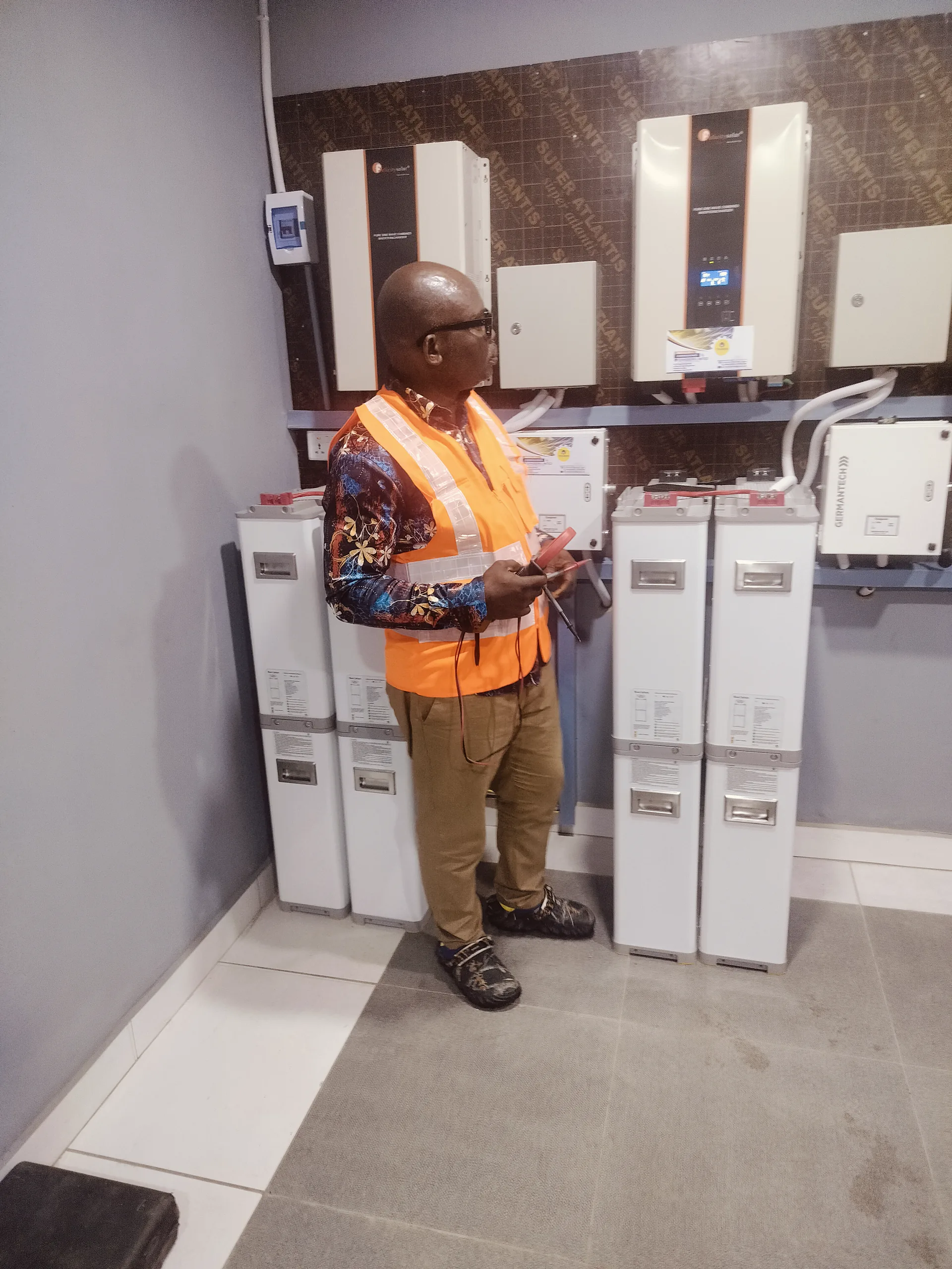 Technician checking energy-room equipment