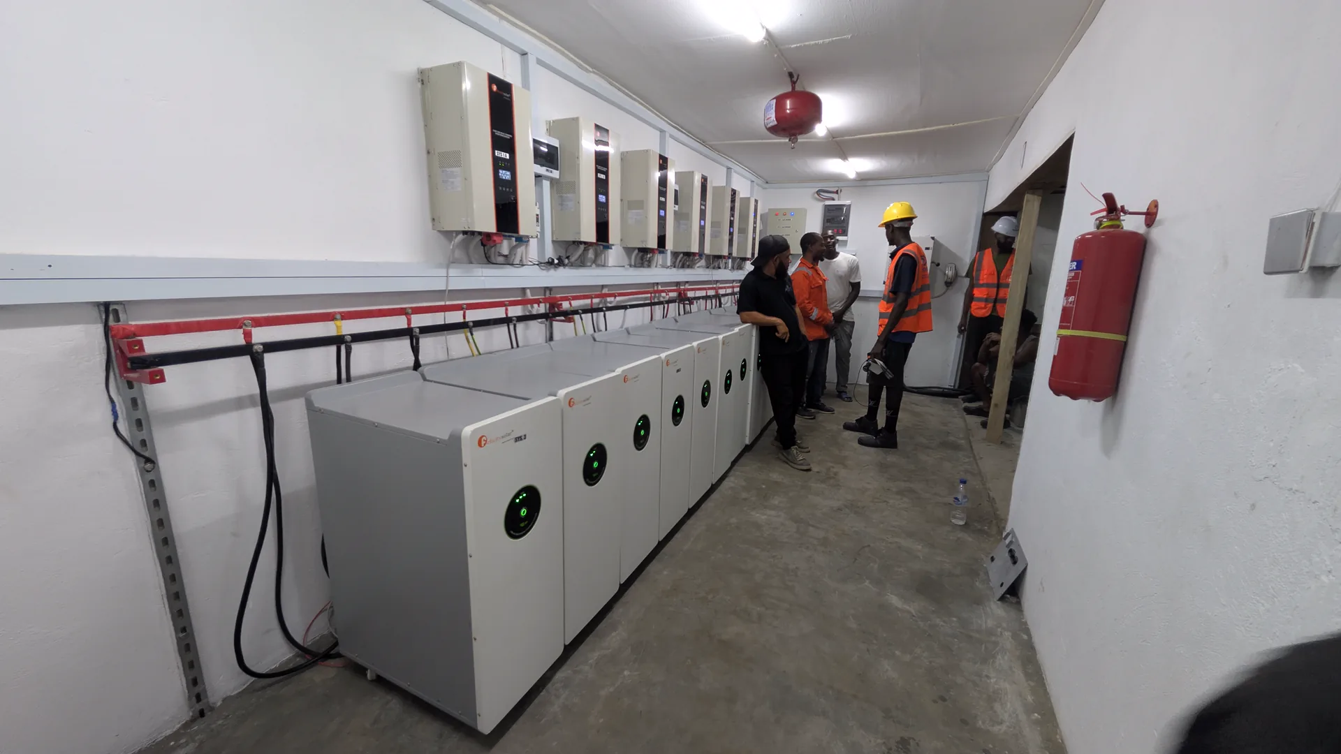 Wide industrial energy-room installation view