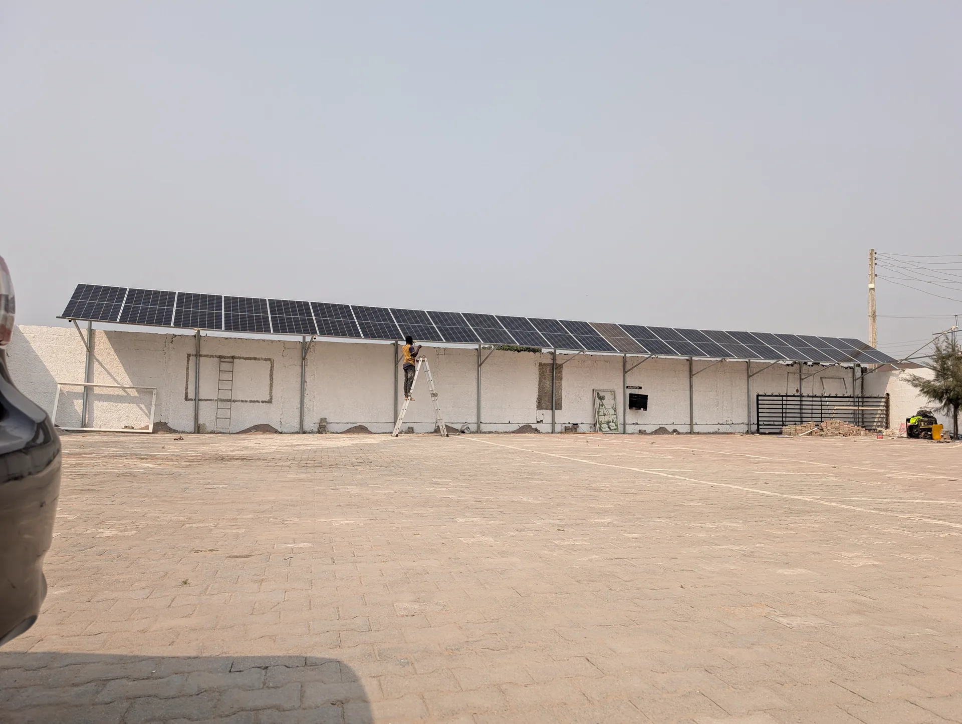 Solar modules installed across a carport structure
